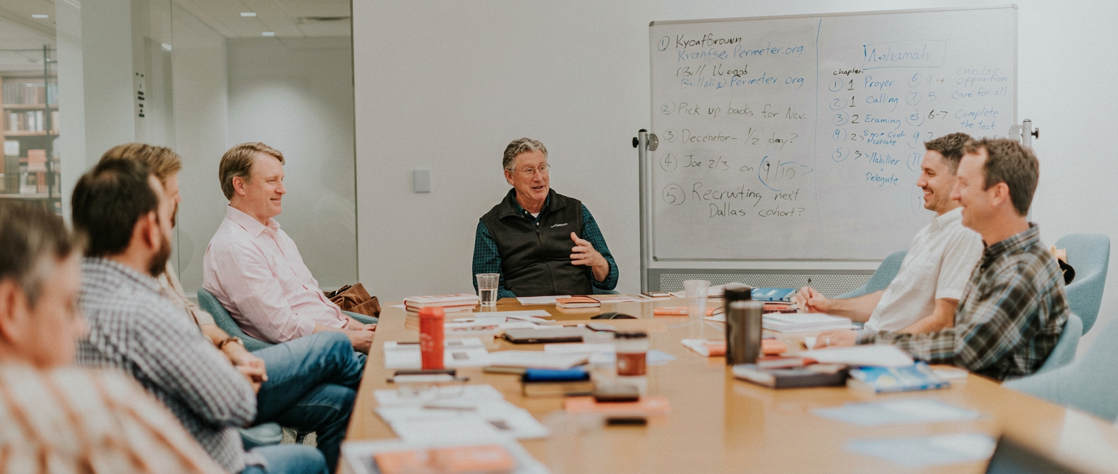 Anágo cohort gathered in conversation